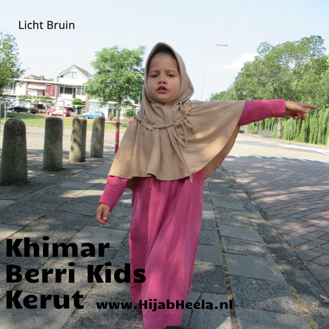 a girl in a pink dress holding a pink frisbee