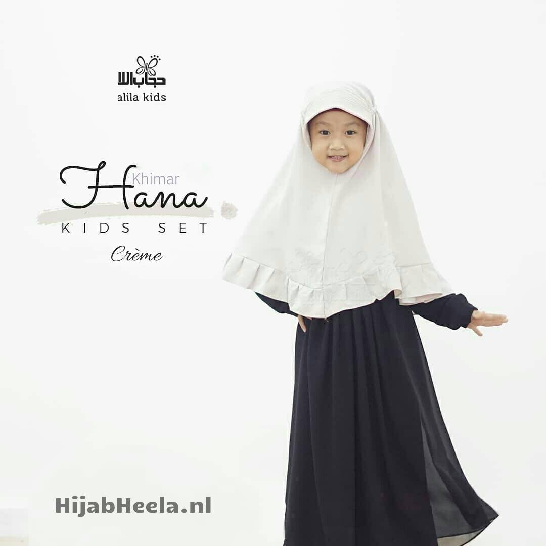 a woman in a white dress holding a purse