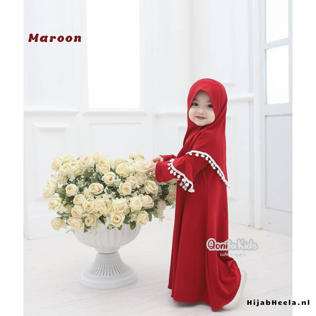 a woman in a red dress holding a vase of flowers