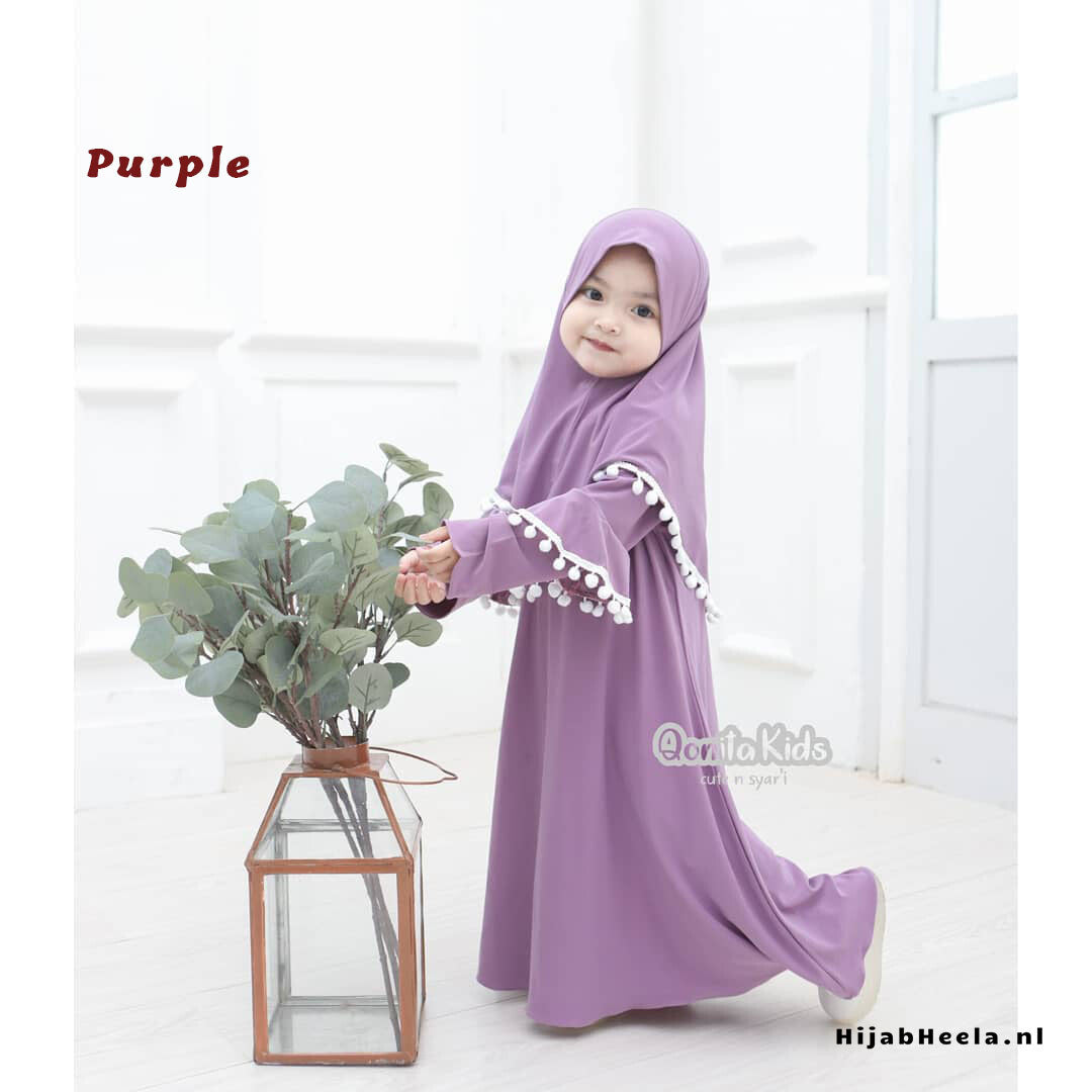 a woman in a pink dress holding a flower